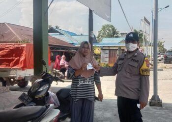 Disiplinkan Prokes, Polsek Muara Badak Terus Lakukan Patroli Yustisi