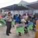 Ciptakan Situasi Yang Aman, Bhabinkamtibmas Kel. Bontang Baru Polres Bontang Lakukan Pengamanan Kegiatan Penyerahan BLT