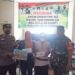 Bhabinkamtibmas Desa Gas Alam Bersama Babinsa Laksanakan Pengamanan Penyaluran Bantuan BLT DD