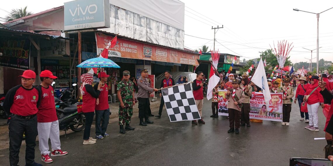 Pengamanan Pawai HUT Kemerdekaan RI Polsek Muara Badak Lakukan Rekayasa Lalin