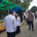 Cegah Kemacetan Lalin Personil Polsek Bontang Utara Melaksanakan Pengawasan Pemanfaatan Jalan/Trotoar di Pasar Ramadhan