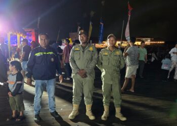 Bhabinkamtibmas Bontang Kuala Laksanakan Cooling System dan Monitoring Pesta Laut Bontang Kuala 2024