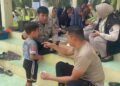 POLRI HADIR MELALUI DOKKES POLRES LANGKAT MELAKSANAKAN BAKTI KESEHATAN KEPADA KEPADA MASYARAKAT DESA HARAPAN MAKMUR